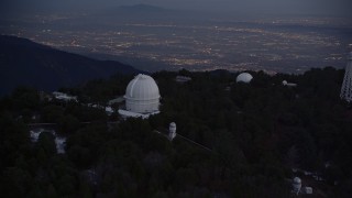 AX0008_052E - 5K aerial stock footage orbiting around the Mount Wilson Observatory at twilight in California
