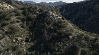 AX0009_025 - 5K aerial stock footage approach and fly over San Gabriel Mountains, California