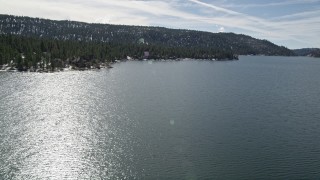 AX0010_023 - 5K aerial stock footage approach waterfront homes on the shore of Big Bear Lake, California