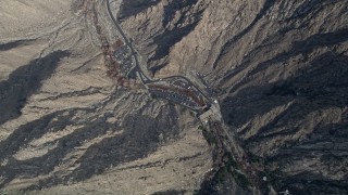 AX0010_124E - 5K aerial stock footage of bird's eye view of the ground station of the aerial tramway in the San Jacinto Mountains, California