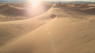 AX0012_029E - 5K aerial stock footage fly low over sand dunes, Kelso Dunes, Mojave Desert, California