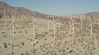 AX0013_006E - 5K stock footage aerial video of wind farm in the desert, San Gorgonio Pass Wind Farm, California