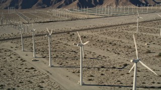 AX0013_010 - 5K aerial stock footage of desert wind farm, San Gorgonio Pass Wind Farm, California