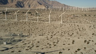 AX0013_012 - 5K stock footage aerial video of desert wind farm, San Gorgonio Pass Wind Farm, California