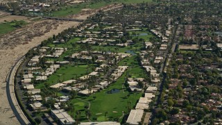 AX0013_043 - 5K aerial stock footage of a residential neighborhood, South Palm Springs, California