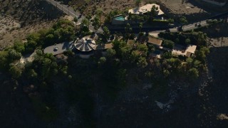 AX0013_048 - 5K aerial stock footage fly away from mansions on the hill, West Palm Springs, California