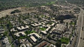 AX0013_060 - 5K aerial stock footage fly over apartment buildings, Rancho Mirage, California