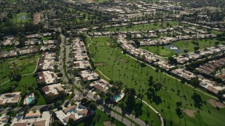 AX0013_069 - 5K aerial stock footage fly over golf course and condominiums, Rancho Mirage, California