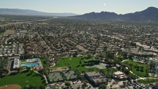 AX0013_071 - 5K aerial stock footage approach residential neighborhoods, Palm Desert, California