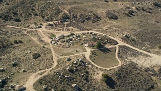 AX0014_016 - 5K aerial stock footage of a rural home in Mountain Center, California