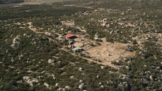 AX0014_024 - 5K aerial stock footage of a rural area with homes, Mountain Center, California