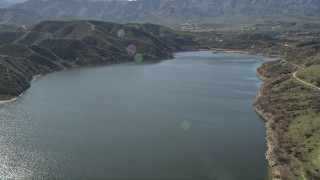 AX0014_031 - 5K aerial stock footage fly high over Lake Hemet, California