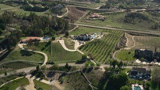 AX0014_055 - 5K aerial stock footage of vineyards and a mansion, Temecula, California