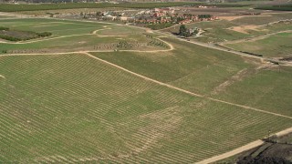 AX0014_058 - 5K aerial stock footage of flying over a crop field in Temecula, California