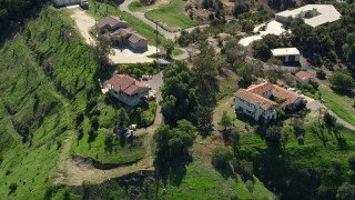 AX0015_018 - 5K aerial stock footage approach large hilltop homes, Fallbrook, California