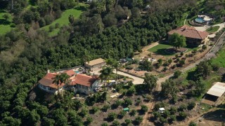 AX0015_022 - 5K aerial stock footage of hilltop houses, Fallbrook, California