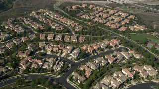 AX0016_076 - 5K aerial stock footage tilt to an upscale view of spacious homes, Newport Beach, California