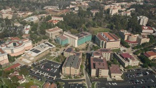 AX0016_078 - 5K aerial stock footage approach and fly by the Irvine School of Medicine in Irvine, California