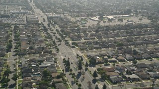 AX0016_108 - 5K aerial stock footage of Bellflower Boulevard through residential neighborhoods, Long Beach, California