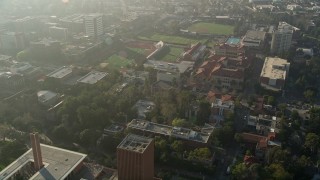 AX0017_043 - 5K aerial stock footage of University of Southern California campus and Cromwell Field, California