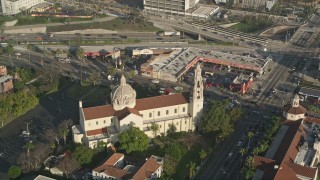 AX0017_058 - 5K aerial stock footage tilt down to a bird's eye of St. Vincent Catholic Church, Los Angeles, California