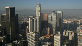 AX0017_063E - 5K aerial stock footage orbiting skyscrapers around US Bank Tower, Downtown Los Angeles, California
