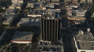AX0017_083 - 5K aerial stock footage approach and tilt down on CNN building, Hollywood, California
