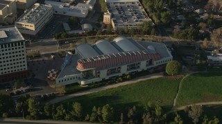 AX0017_106 - 5K aerial stock footage of Walt Disney Company studios tilt down on animation building, Burbank, California