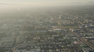 AX0017_110 - 5K aerial stock footage of orbiting apartment buildings, North Hollywood, California
