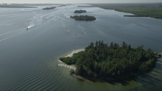 AX0018_087 - 5K aerial stock footage flying over mangroves on the Indian River in Florida