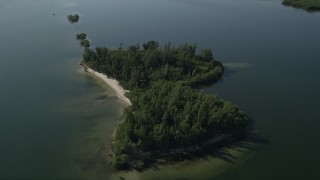 AX0018_090E - 5K aerial stock footage approach mangroves in Indian River, Florida