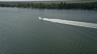 AX0019_022 - 5K aerial stock footage of fishing Boat on the Indian River near Hobe Sound in Florida