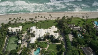 AX0019_025 - 5K aerial stock footage of a beachfront mansion in Hobe Sound, Florida