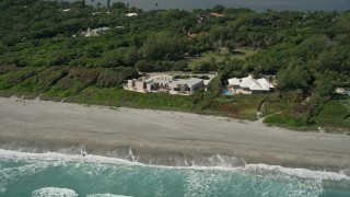 AX0019_028 - 5K aerial stock footage of a pair of beachfront mansions in Hobe Sound, Florida