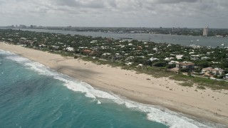 AX0019_052E - 5K aerial stock footage of beach and coastal neighborhoods in Palm Beach, Florida