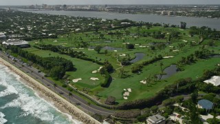 AX0019_054 - 5K aerial stock footage of oceanfront golf course in Palm Beach, Florida
