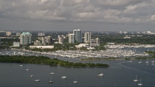 AX0020_002E - 5K aerial stock footage of sailboats at Dinner Key Marina in Coconut Grove, Florida