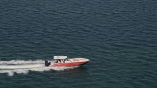 AX0020_008E - 5K aerial stock footage track speedboat racing across Biscayne Bay, Florida