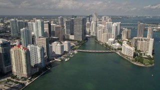 AX0020_023 - 5K aerial stock footage of Downtown Miami and Brickell Key skyscrapers in Florida