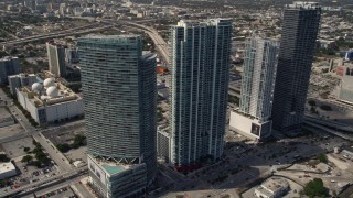 AX0020_030 - 5K aerial stock footage of four tall skyscrapers in Downtown Miami, Florida