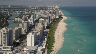 AX0020_058 - 5K aerial stock footage fly over beachfront condominiums with ocean views in Miami Beach, Florida