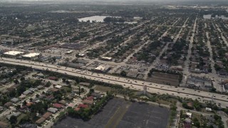 AX0020_107 - 5K aerial stock footage of light traffic on Interstate 95 through Miami Shores, Florida