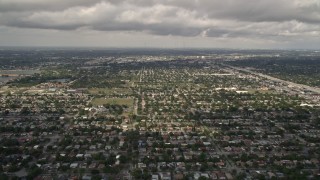 AX0020_108 - 5K aerial stock footage of flyby suburban neighborhoods in Miami Shores, Florida