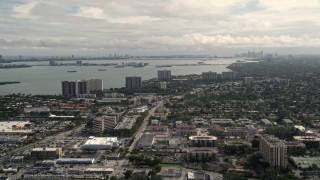 AX0021_005 - 5K aerial stock footage of apartments and homes in the coastal community of Miami Shores, Florida