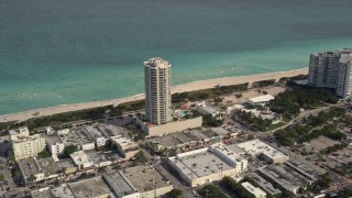 AX0021_021 - 5K stock footage aerial video of beachfront condominium complex in Miami Beach, Florida