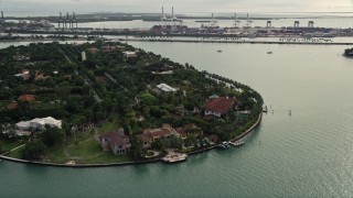 AX0021_074 - 5K aerial stock footage of waterfront mansions on Star Island, Florida