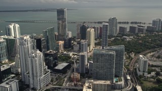 AX0021_082E - 5K aerial stock footage of Downtown Miami skyscrapers around the Four Seasons Hotel high-rise, Florida
