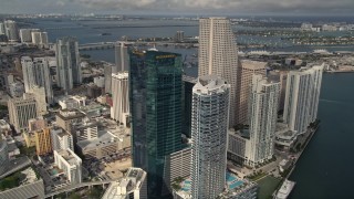 AX0021_089E - 5K aerial stock footage approach modern high-rises and hotel in Downtown Miami, Florida