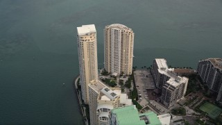 AX0021_103 - 5K aerial stock footage of waterfront skyscrapers on Brickell Key in Downtown Miami, Florida