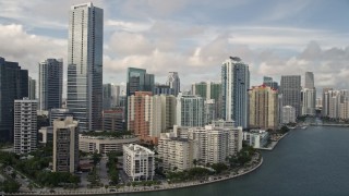 AX0021_117E - 5K aerial stock footage tilt to reveal skyline of Downtown Miami, Florida